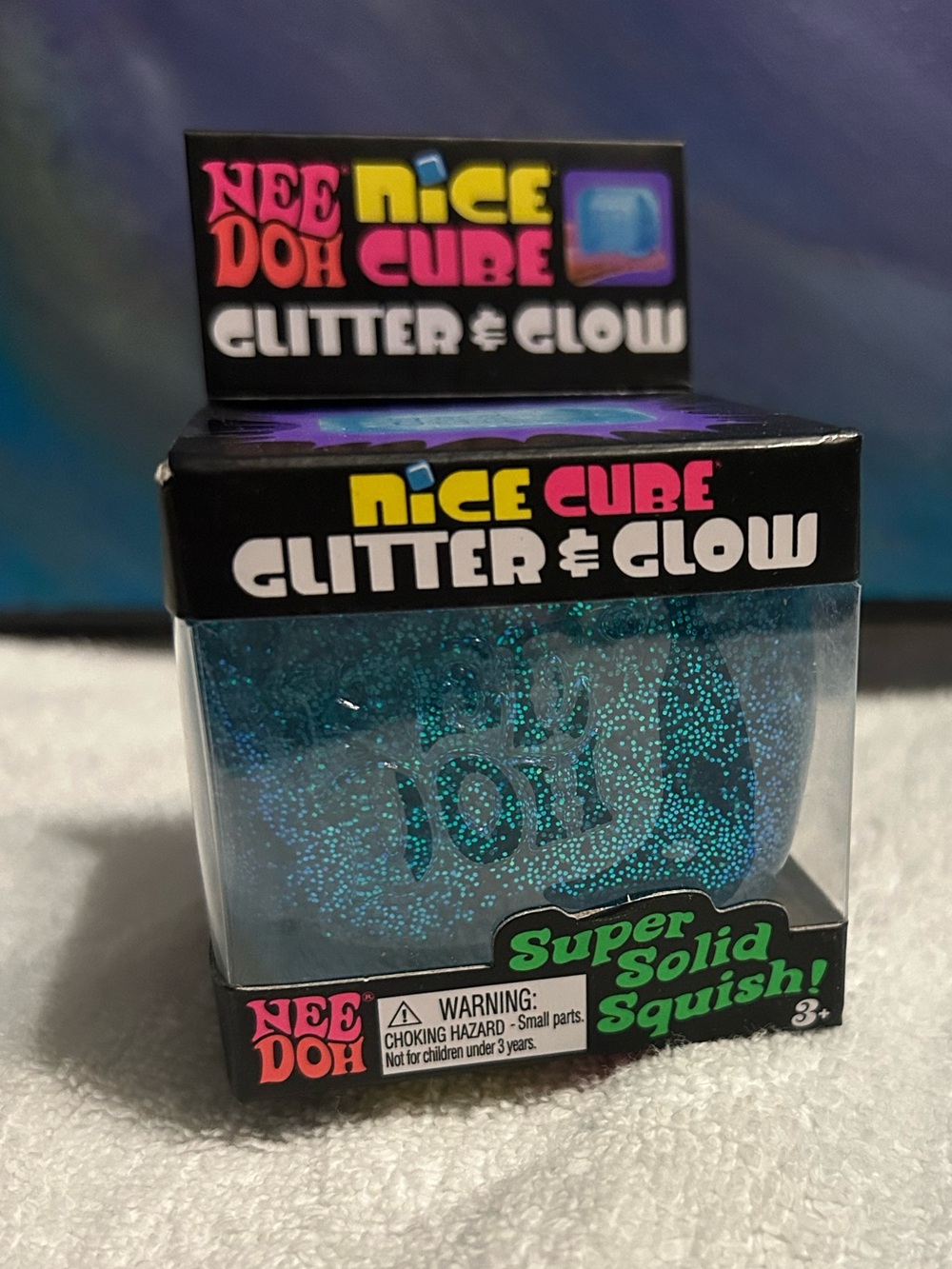 Nice Cube Glitter & Glow Blue Squish Ball
